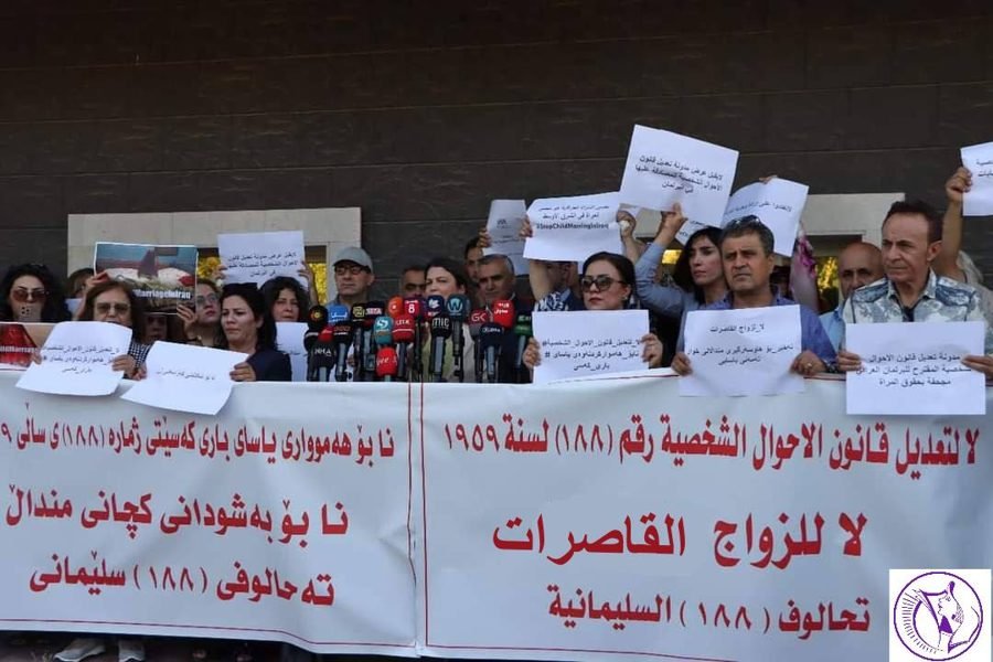 A press conference: banners reject amending Personal Status Law No. 188 and oppose the marriage of minors.